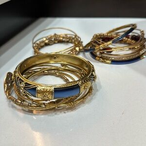Assortment of gold bangle bracelets